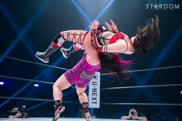 Chihiro Hashimoto lifting Himeka up high and going for a german suplex